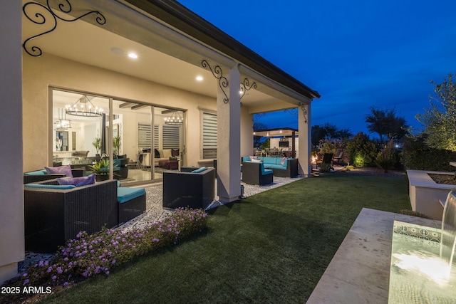 351 E Santa Lucia Ln, Queen Creek, AZ 85140 - yard at twilight featuring an outdoor living space and a patio