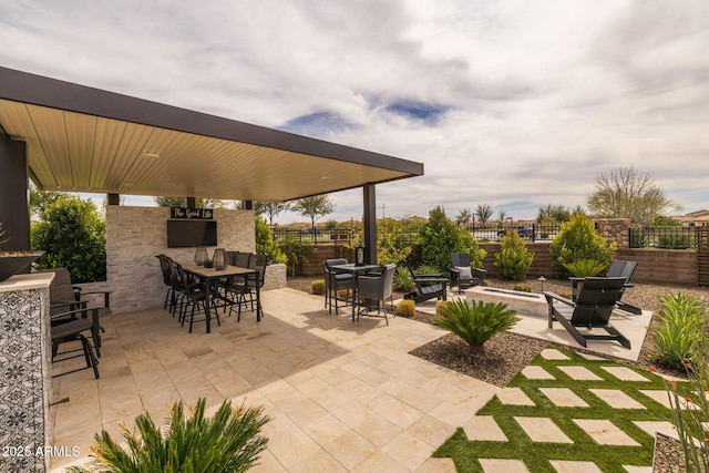 351 E Santa Lucia Ln, Queen Creek, AZ 85140 - view of patio featuring a fire pit, outdoor dining space, and fence