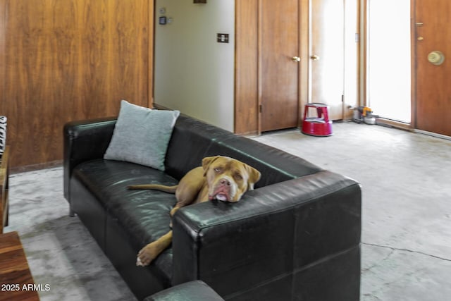 living room with concrete floors