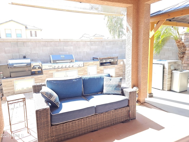 2678 S 172nd Dr, Goodyear, AZ 85338 - view of patio featuring area for grilling, a grill, outdoor lounge area, and fence
