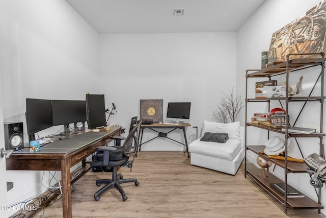 office space featuring light hardwood / wood-style floors