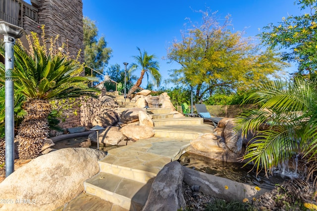 view of yard featuring a patio area and fence