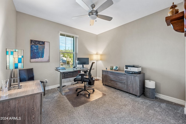 carpeted office featuring ceiling fan