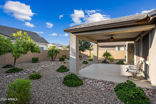 view of patio / terrace featuring ceiling fan