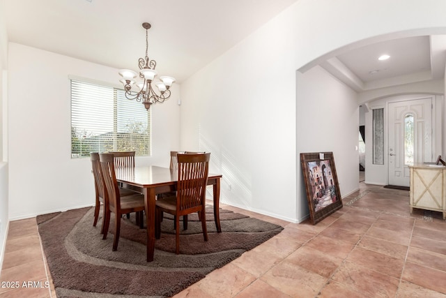 dining area featuring a chandelier