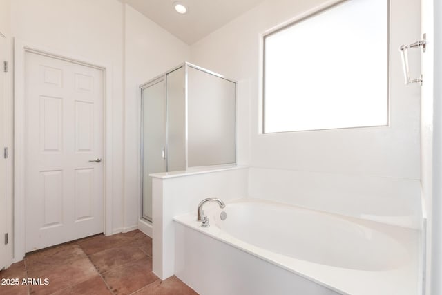 bathroom featuring plus walk in shower