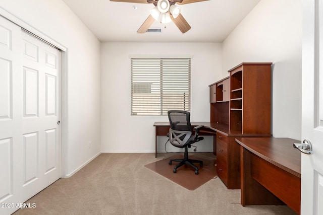 office featuring light colored carpet and ceiling fan