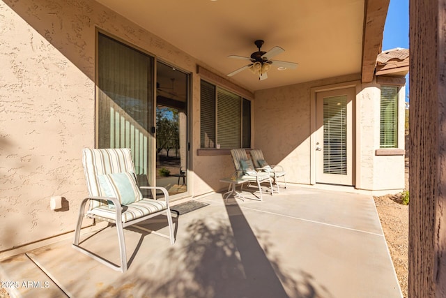 view of patio / terrace featuring ceiling fan