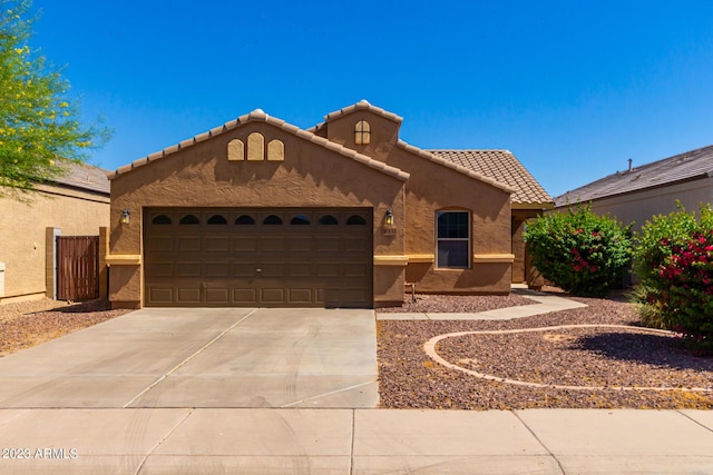 view of front of property featuring a garage