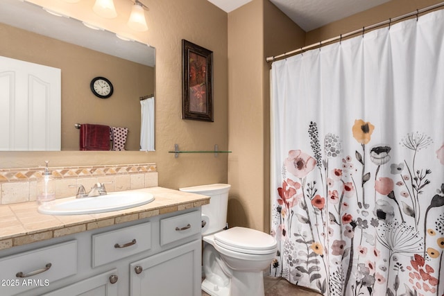 full bathroom with toilet, a shower with shower curtain, vanity, and tile patterned floors