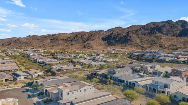 birds eye view of property featuring a mountain view