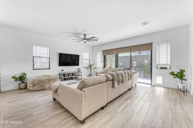 living room with ceiling fan