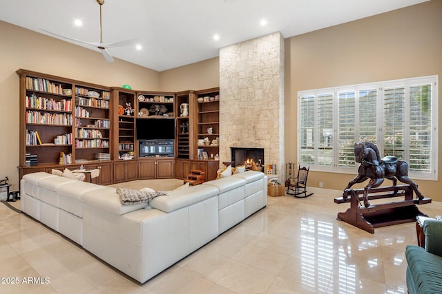 11809 S Montezuma Ct, Phoenix, AZ 85044 - living area featuring ceiling fan, light tile patterned floors, recessed lighting, and a fireplace