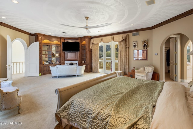 11809 S Montezuma Ct, Phoenix, AZ 85044 - bedroom featuring arched walkways, crown molding, light colored carpet, recessed lighting, and access to outside