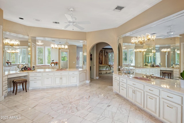 11809 S Montezuma Ct, Phoenix, AZ 85044 - bathroom with a chandelier, a ceiling fan, plenty of natural light, and marble finish floors