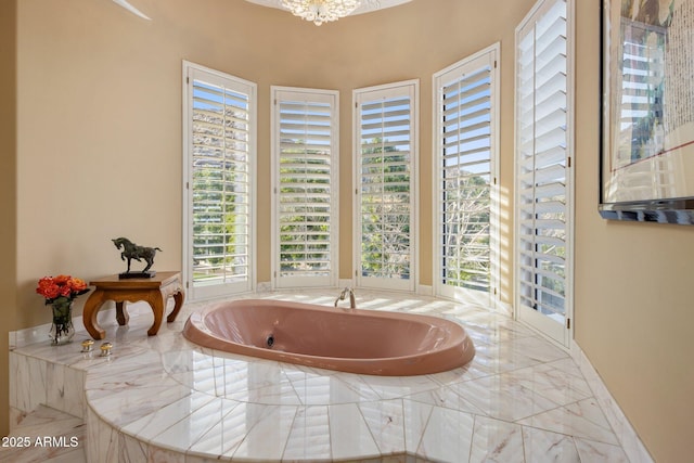 11809 S Montezuma Ct, Phoenix, AZ 85044 - full bath featuring a garden tub and a chandelier