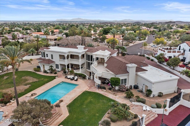 11809 S Montezuma Ct, Phoenix, AZ 85044 - aerial perspective of suburban area with a pool and a mountain backdrop