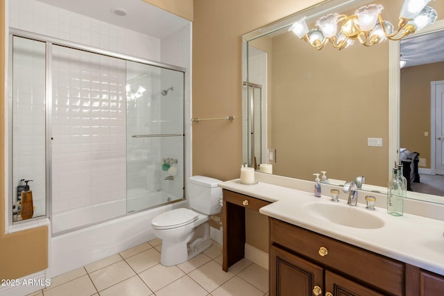 11809 S Montezuma Ct, Phoenix, AZ 85044 - full bath featuring tile patterned floors, a chandelier, toilet, shower / bath combination with glass door, and vanity