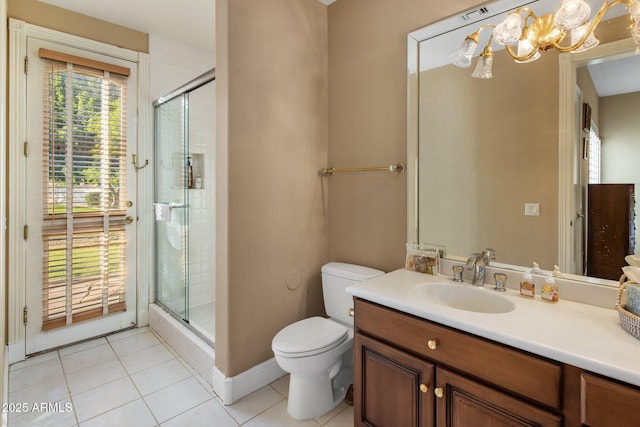 11809 S Montezuma Ct, Phoenix, AZ 85044 - full bathroom featuring a shower stall, tile patterned floors, toilet, vanity, and baseboards