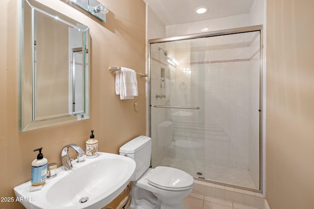 11809 S Montezuma Ct, Phoenix, AZ 85044 - full bath featuring a sink, toilet, a shower stall, and tile patterned flooring