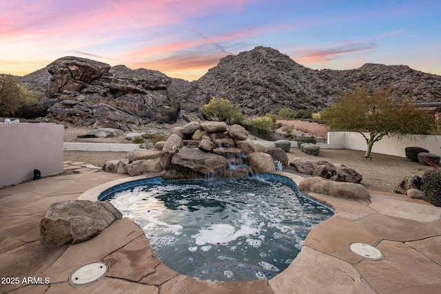 11809 S Montezuma Ct, Phoenix, AZ 85044 - view of pool with a mountain view, fence, a jacuzzi, and a patio area