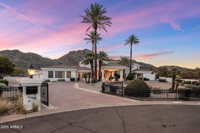 11809 S Montezuma Ct, Phoenix, AZ 85044 - mediterranean / spanish house with a mountain view, a fenced front yard, and a tiled roof