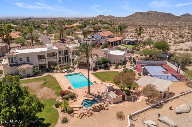 11809 S Montezuma Ct, Phoenix, AZ 85044 - aerial perspective of suburban area with a pool and a mountainous background