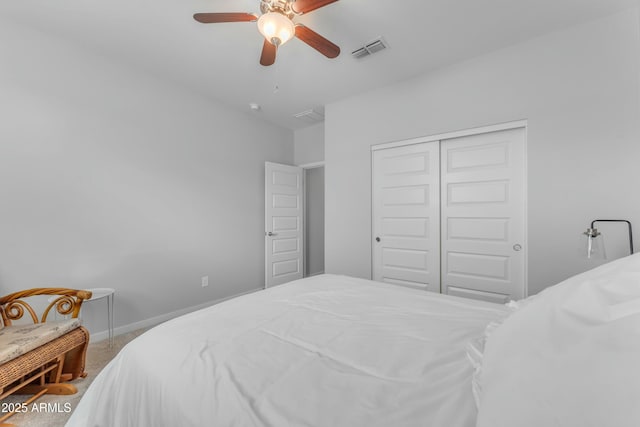 696 W Glen Canyon Dr, San Tan Valley, AZ 85140 - carpeted bedroom featuring a closet, visible vents, baseboards, and a ceiling fan