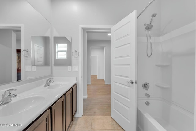 696 W Glen Canyon Dr, San Tan Valley, AZ 85140 - full bath featuring bathtub / shower combination, tile patterned floors, double vanity, and a sink