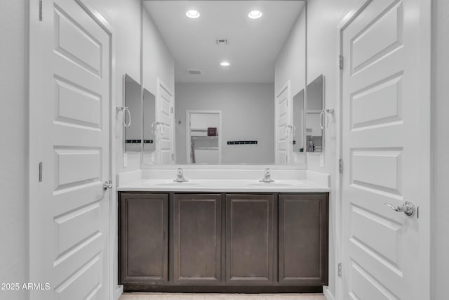 696 W Glen Canyon Dr, San Tan Valley, AZ 85140 - full bathroom with a sink, visible vents, recessed lighting, and double vanity
