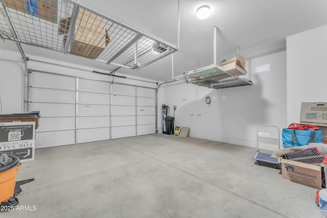 696 W Glen Canyon Dr, San Tan Valley, AZ 85140 - garage featuring baseboards