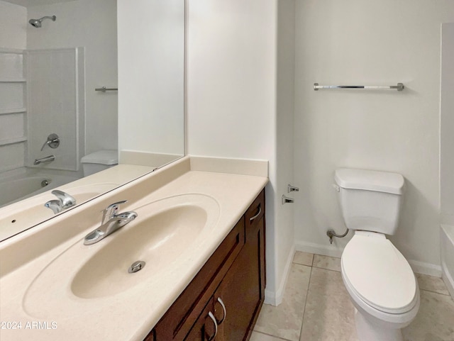 full bathroom featuring tile flooring, toilet, bathtub / shower combination, and vanity