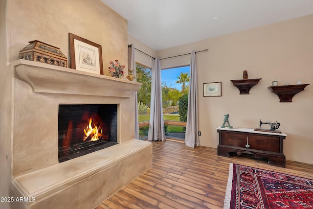 living area featuring hardwood / wood-style floors