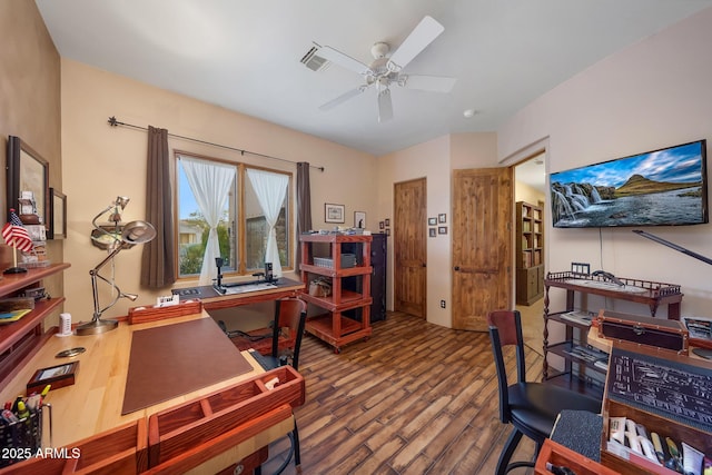 office space with hardwood / wood-style flooring and ceiling fan