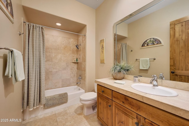 full bathroom with vanity, toilet, and shower / tub combo with curtain