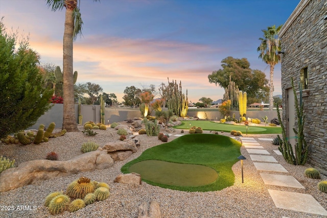 yard at dusk with a water view