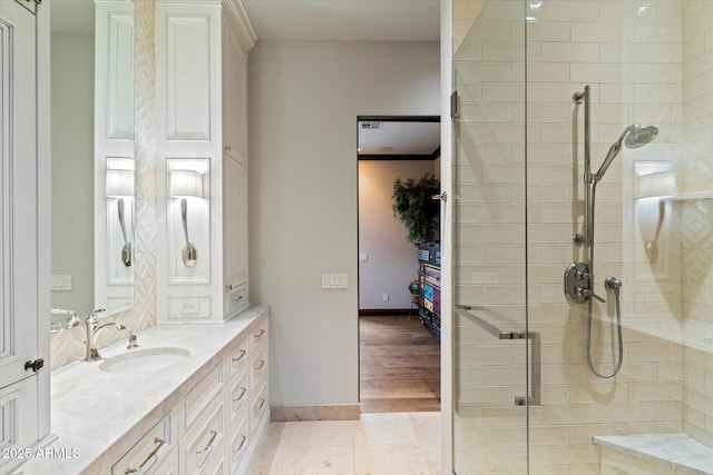 bathroom featuring vanity, tile patterned floors, and walk in shower