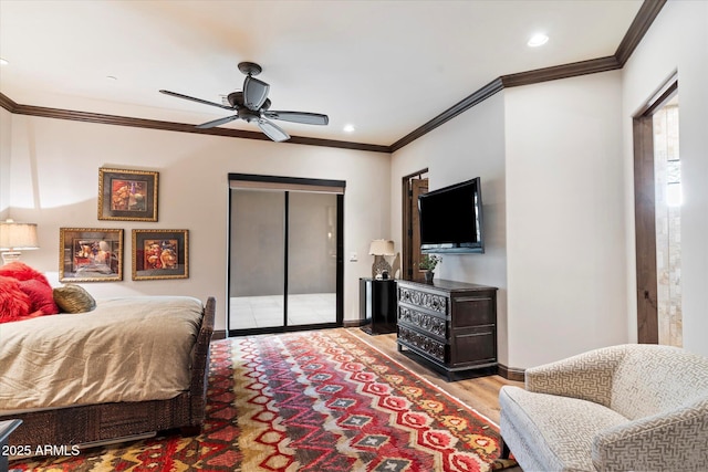 bedroom with ornamental molding, a closet, ceiling fan, and light hardwood / wood-style flooring