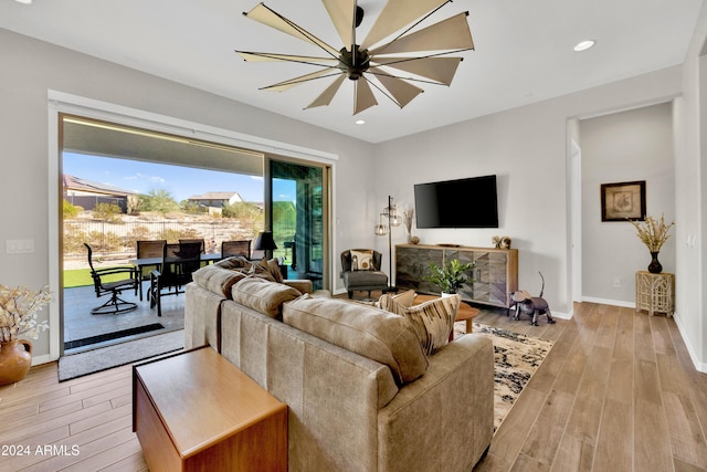 living room featuring a chandelier