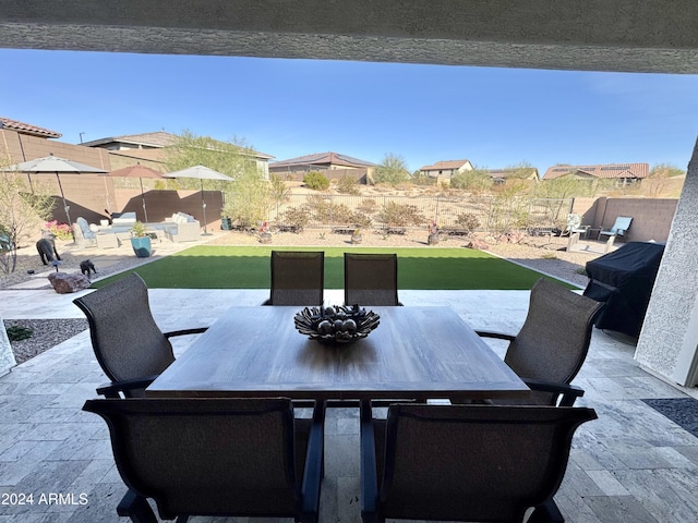 view of patio with a grill