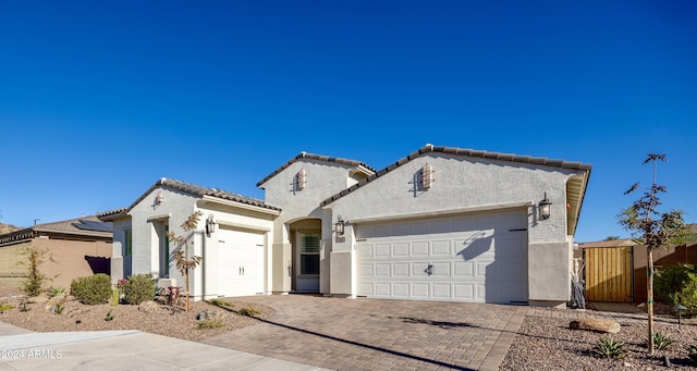 view of front of property featuring a garage