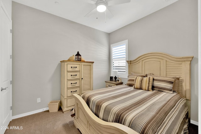 bedroom featuring light colored carpet and ceiling fan