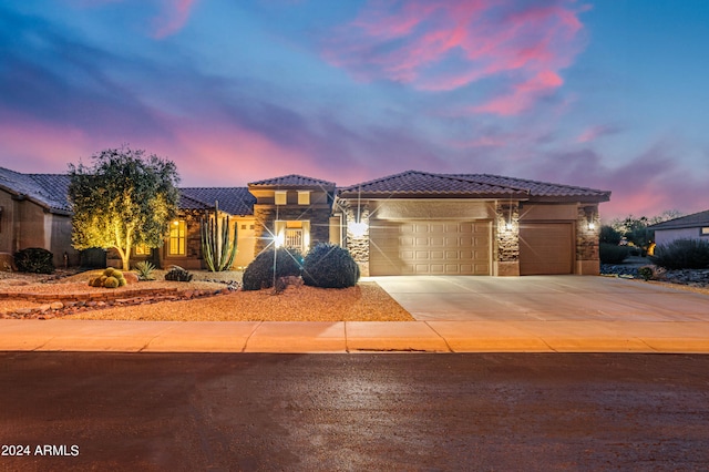 view of front of home with a garage