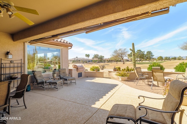 view of patio featuring ceiling fan