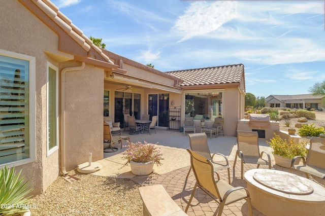 view of patio with ceiling fan