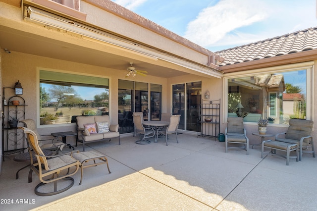 view of patio with ceiling fan and an outdoor hangout area