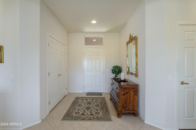 foyer with light tile patterned floors