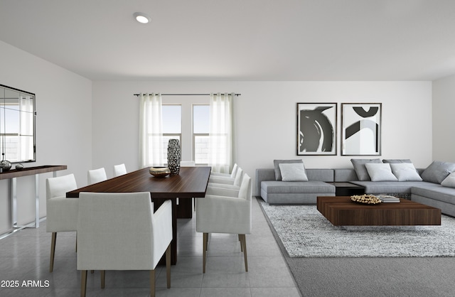 tiled dining space featuring recessed lighting