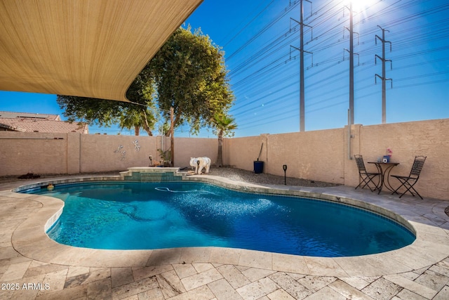 view of swimming pool featuring a patio