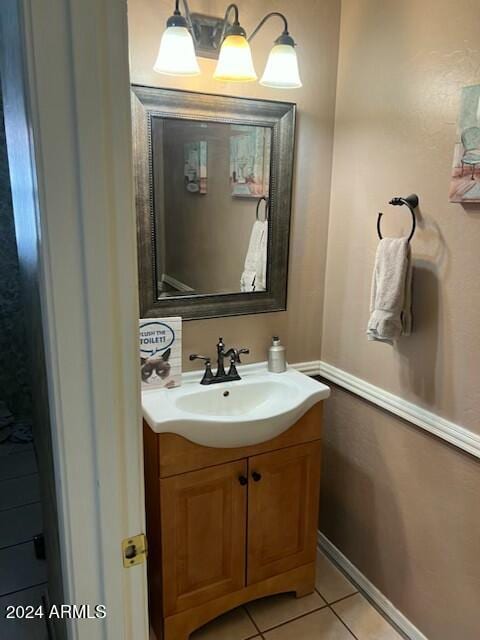 bathroom with tile patterned floors and vanity